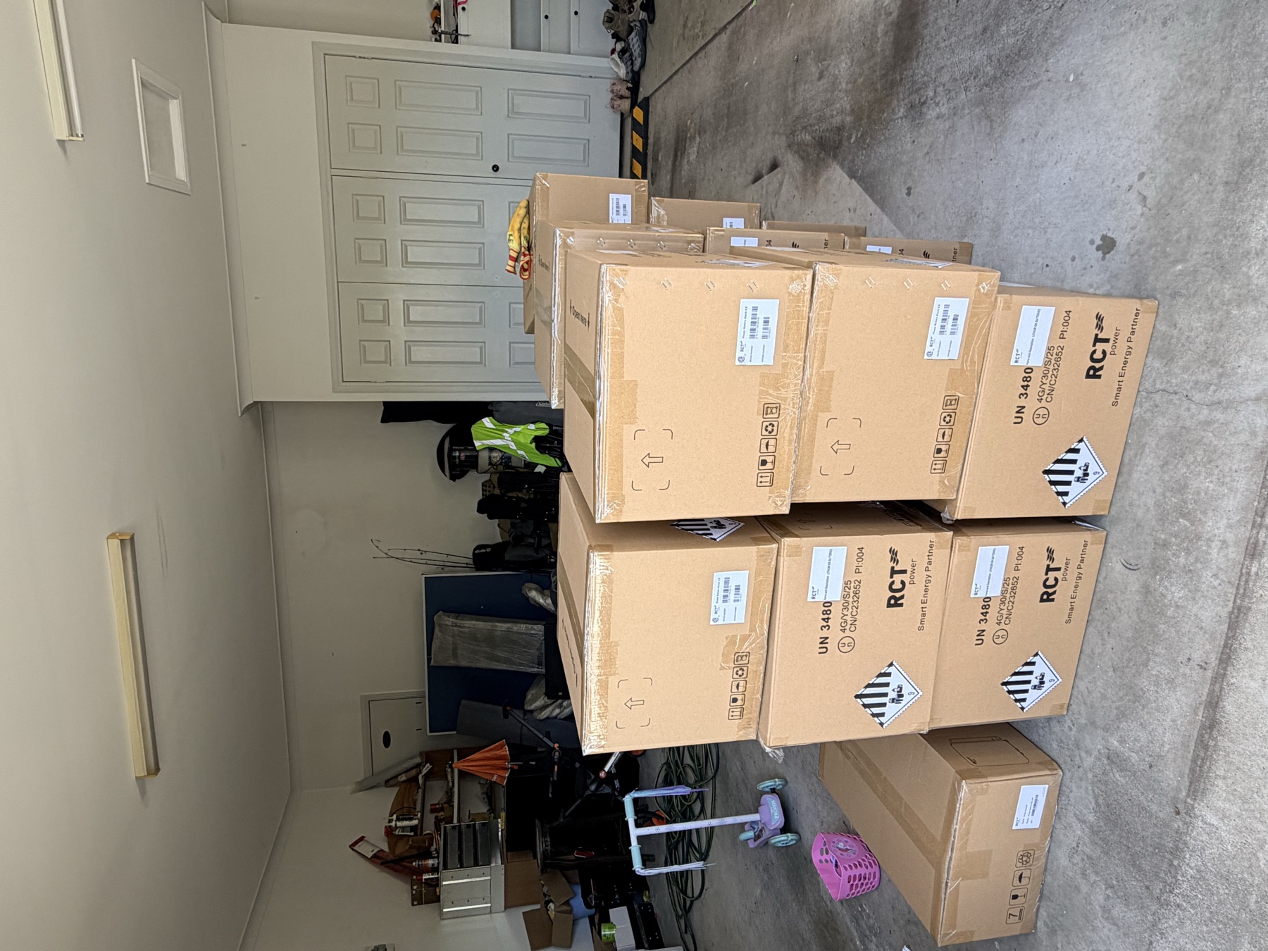 Garage stacked with RCT Power battery cartons