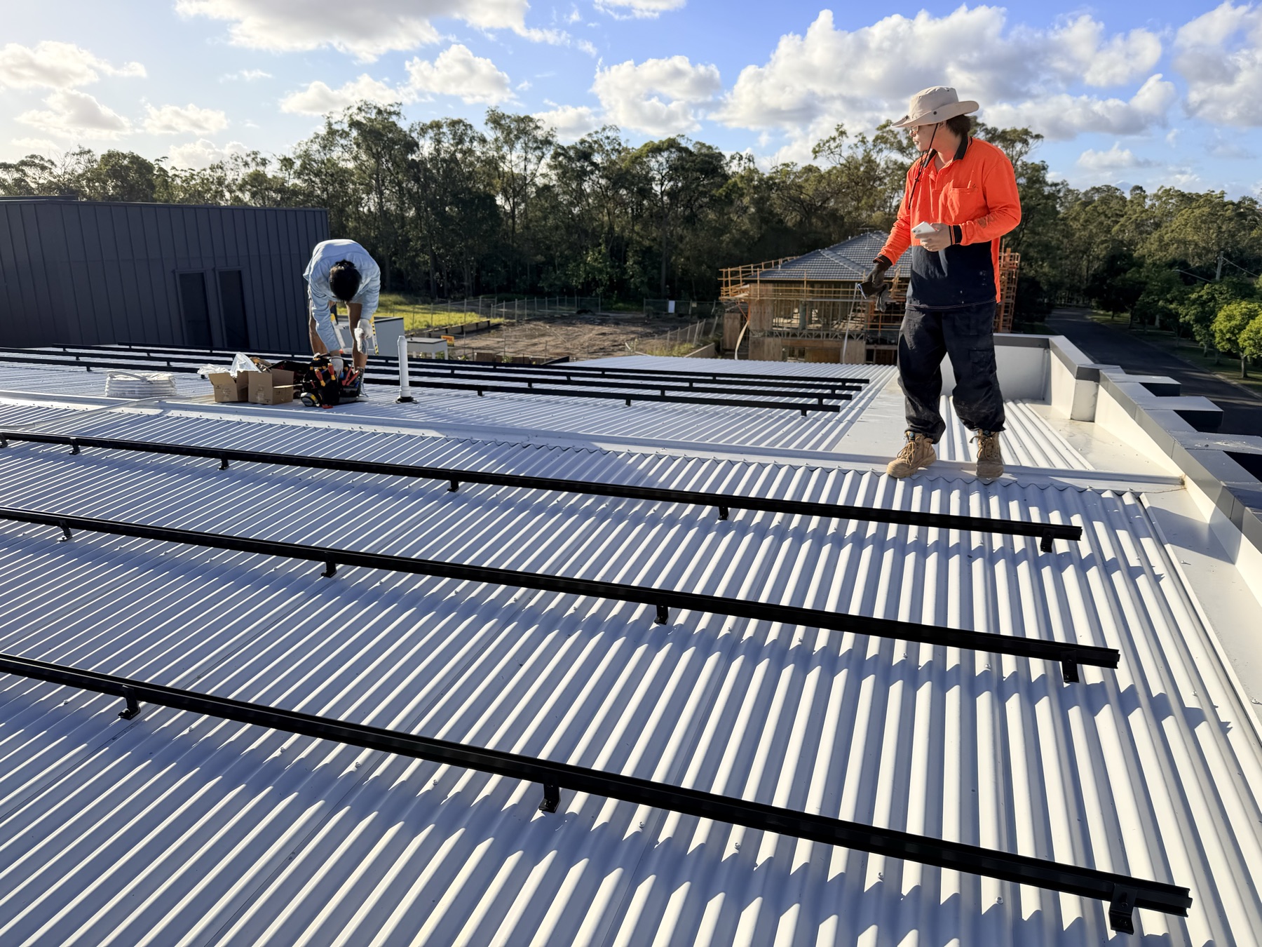 Mounting rails being fixed to the metal roof